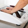 Foot massage device by reflexology and thermotherapy